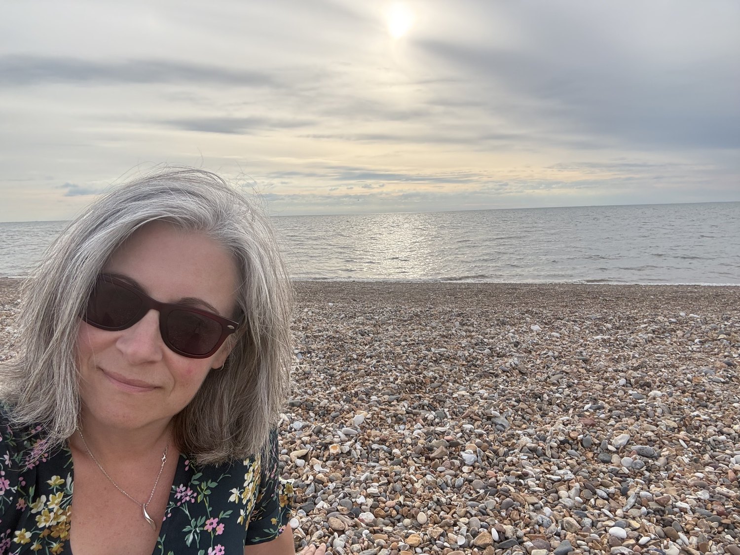 Abbie Martin smiling at the seaside